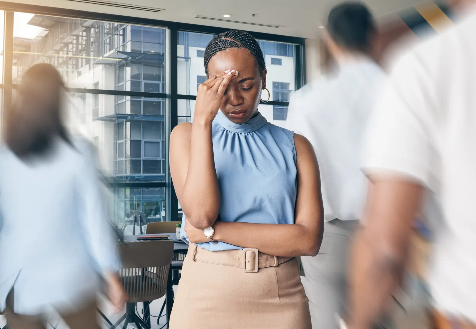 A professional experiencing pressure in a workplace